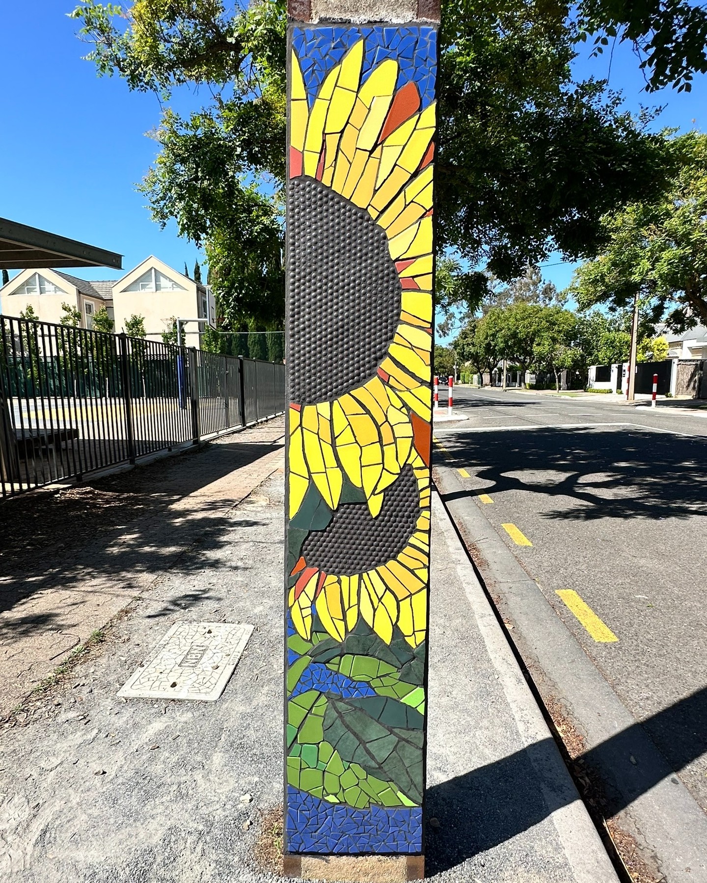 Sunflowers stobie pole art by Travis Cox