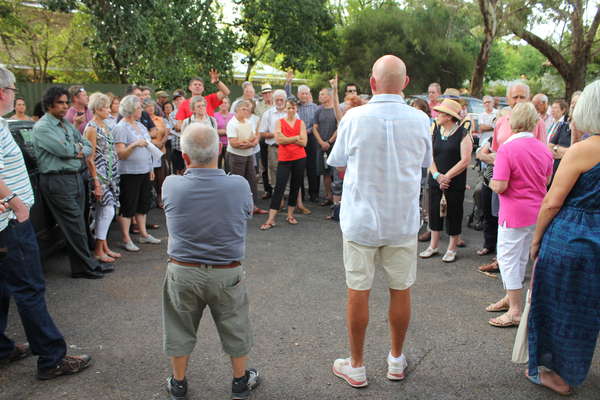 Local Councillors Isaac Pasalidis (left) and John Frogley (right) talking to local residents.